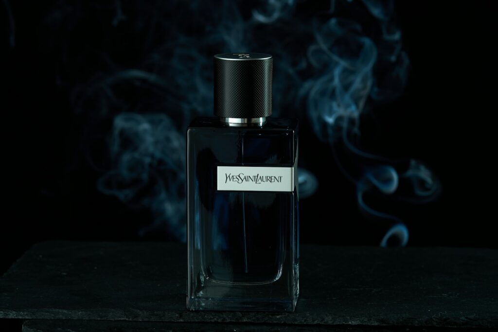 a bottle of perfume sitting on top of a table